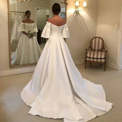 Elegant Off-the-Shoulder Short Sleeve A-Line Bridal Gown Featuring Satin Ruffles and a Train