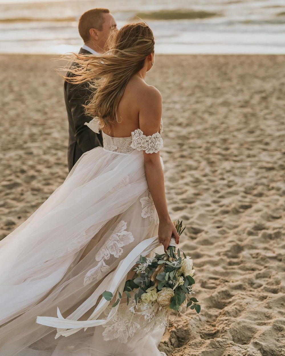 Elegant Off-the-Shoulder A-Line Wedding Gown with Lace Appliques and Tulle