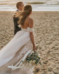 Elegant Off-the-Shoulder A-Line Wedding Gown with Lace Appliques and Tulle