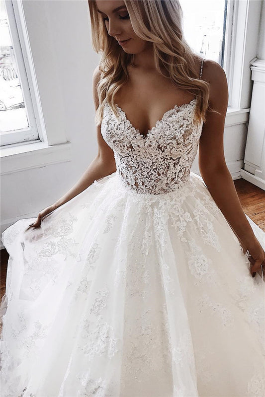 Elegant A-Line Bridal Gowns Featuring Spaghetti Straps and Lace Appliques