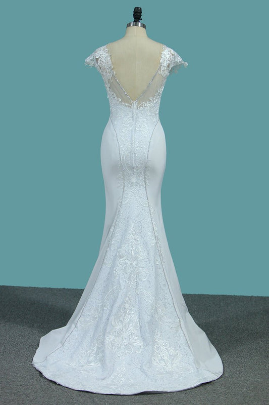 Elegant Mermaid Bateau Wedding Gown with Beaded Appliques and Lace