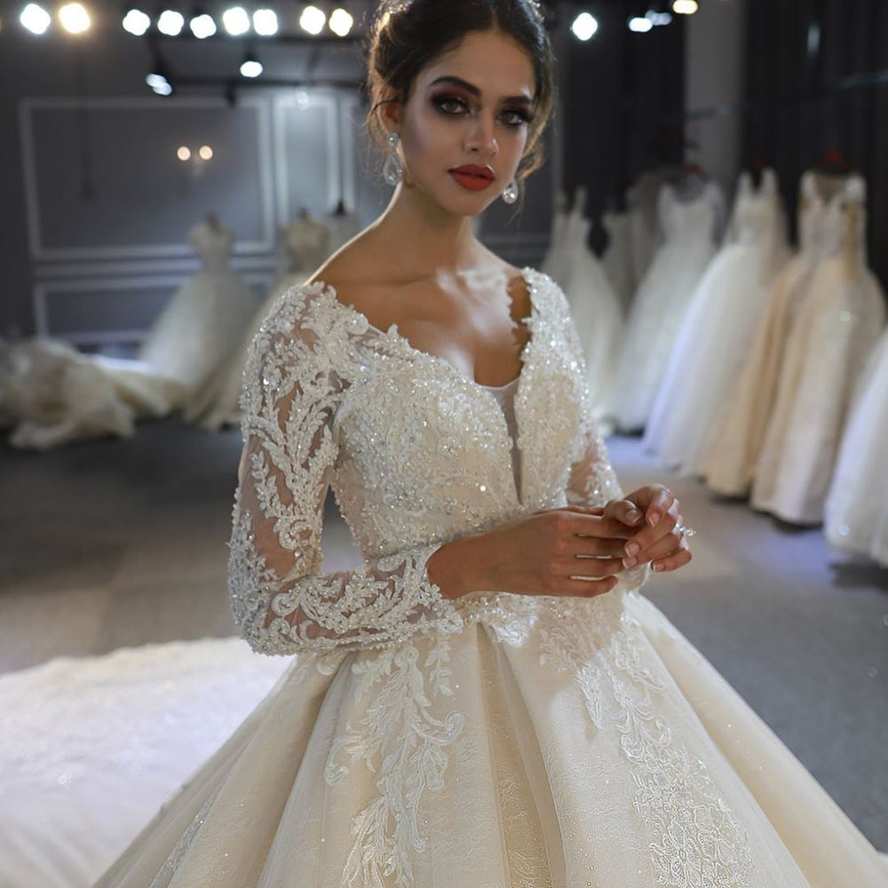 Sweetheart Backless Modest A-Line Wedding Gown with Long Sleeves and Lace Appliques Sequins