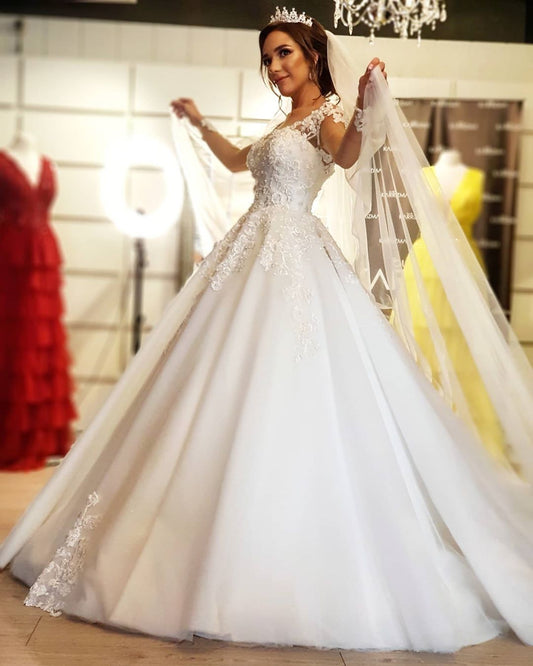 A-line Off-the-shoulder Wedding Dress with Elegant Long Sleeves and Appliques