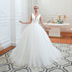 Elegant A-Line Wedding Gown with Deep V-Neck and Wide Tulle Straps