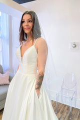Sweetheart A-Line Wedding Dress with Elegant Spaghetti Straps and Satin Backless Design