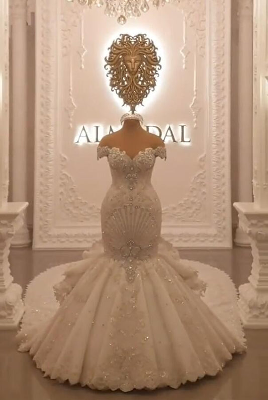 Elegant Off-The-Shoulder Mermaid Wedding Dress with Crystal Details and Backless Design