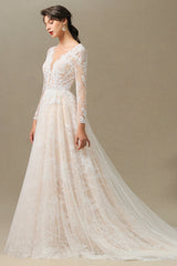 Elegant Long-Sleeve Illusion Wedding Gown in Sheer Tulle with Lace