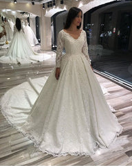 Elegant Floor-length Deep V-neck A-line Wedding Dress with Lace Appliques and Long Sleeves