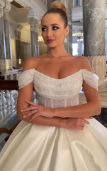 Elegant Off-The-Shoulder Satin Bridal Gown with Sequins