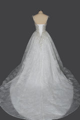 Elegant Sweetheart Ball Gown with Pleated Straps and Sequins