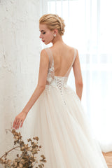 Elegant A-Line Wedding Dress with Deep V-neck and Floor-length Tulle