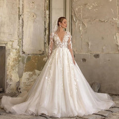 Elegant Deep V-neck A-Line Wedding Gown with Long Sleeves and Tulle Lace Ruffles