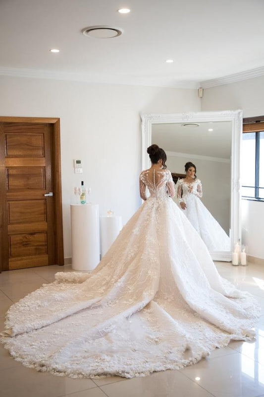 Elegant Sweetheart A-line Wedding Gown with Open Back and Long Lace Sleeves
