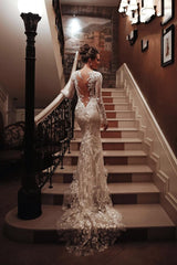 Elegant Backless Mermaid Wedding Gown with Vintage High Neck, Long Sleeves, and Lace Appliques