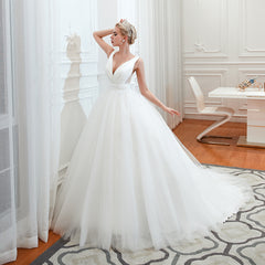 Elegant A-Line Wedding Gown with Deep V-Neck and Wide Tulle Straps