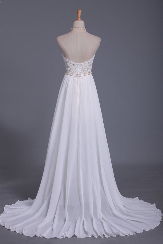 Elegant Halter Wedding Gown in Chiffon with Backless Design and Pearl Lace Ruffles