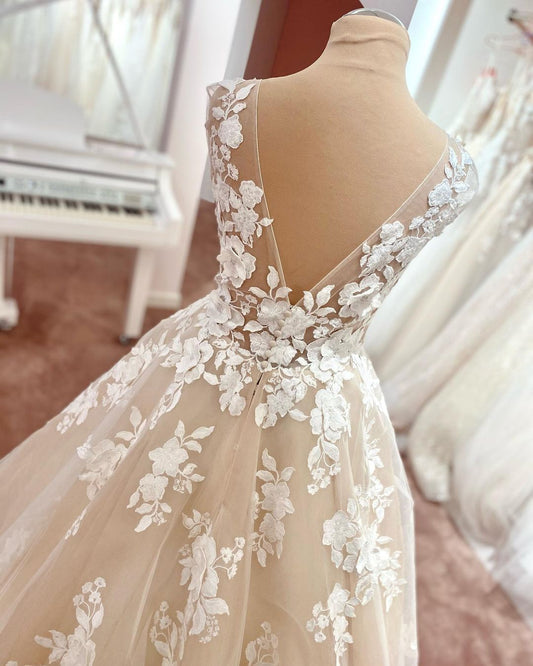Elegant V-neck A-Line Wedding Gown with Backless Design, Wide Straps, and Lace Tulle Appliques