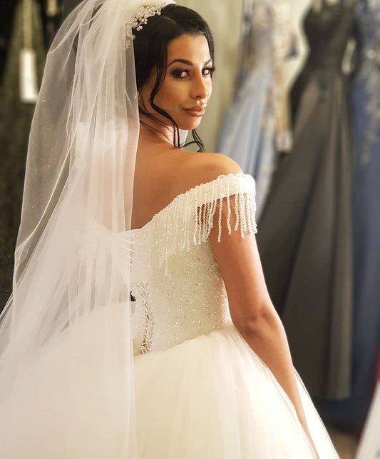 Off-the-shoulder Beaded Backless Wedding Gown with Elegant Floor-length Tassel Tulle