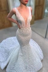 Long Sleeveless Mermaid Wedding Dress With Deep V-Neck and Lace Appliques