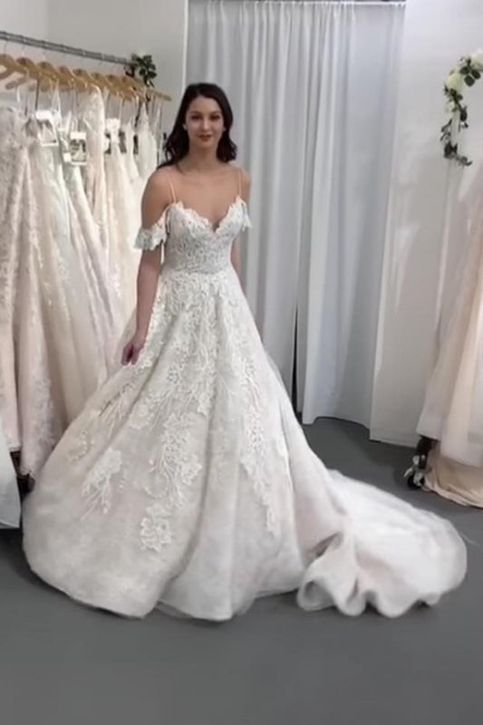 Elegant A-line Wedding Gown with Spaghetti Straps and Backless Tulle Lace