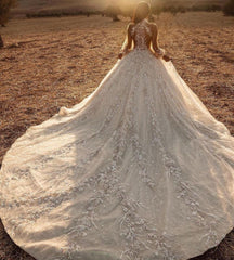 Elegant A-Line Tulle Wedding Gown with High Neck, Long Sleeves, and Lace Appliques