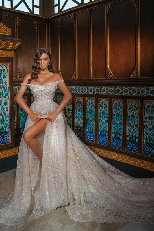 Elegant Long Off-The-Shoulder Wedding Dresses Featuring Sequins and a Slit