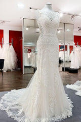 Elegant White Mermaid Wedding Gown with Open Back and Tulle Lace