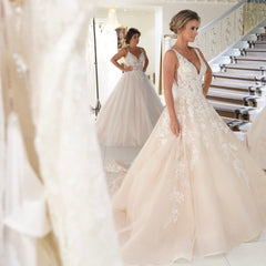 Elegant Backless A-Line Wedding Gown with Deep V-Neck and Spaghetti Straps in Applique Lace