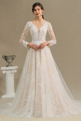 Elegant Long-Sleeve Illusion Wedding Gown in Sheer Tulle with Lace