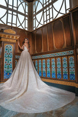 Elegant Long Off-The-Shoulder Wedding Dresses Featuring Sequins and a Slit