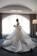 Stunning Mermaid Lace Wedding Gown with Long Sleeves and Detachable Bowknot Skirt