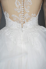 Elegant Long Sleeve Ruffled Ball Gown Wedding Dress Featuring Lace Appliques