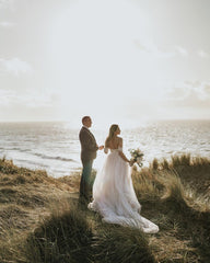 Elegant Off-the-Shoulder A-Line Wedding Gown with Lace Appliques and Tulle