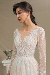 Elegant Long-Sleeve Illusion Wedding Gown in Sheer Tulle with Lace