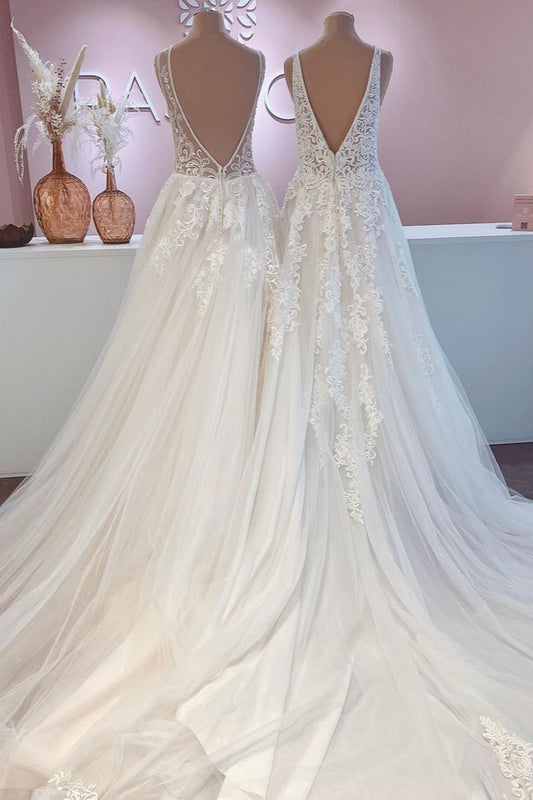 Contemporary A-Line Wedding Gown with Open Back, Lace Train, and Wide Straps Featuring Tulle Appliques