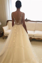 Elegant Sweetheart A-line Wedding Gown with Open Back and Long Tulle