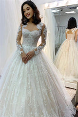 Sweetheart Ball Gown Wedding Dress with Long Sleeves and Applique