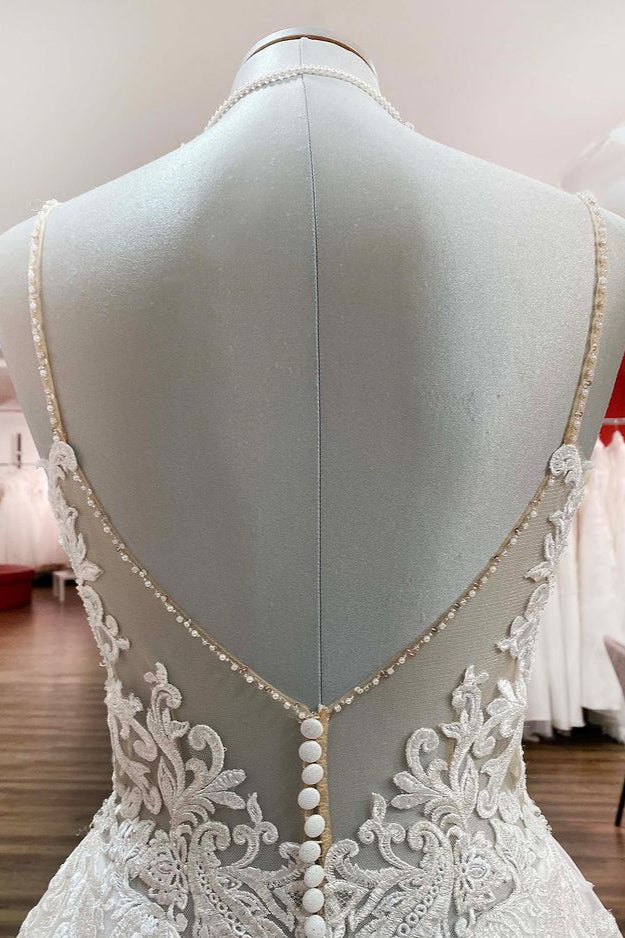 Elegant Long A-line Wedding Dress with V-neck, Spaghetti Straps, and Lace Ruffles