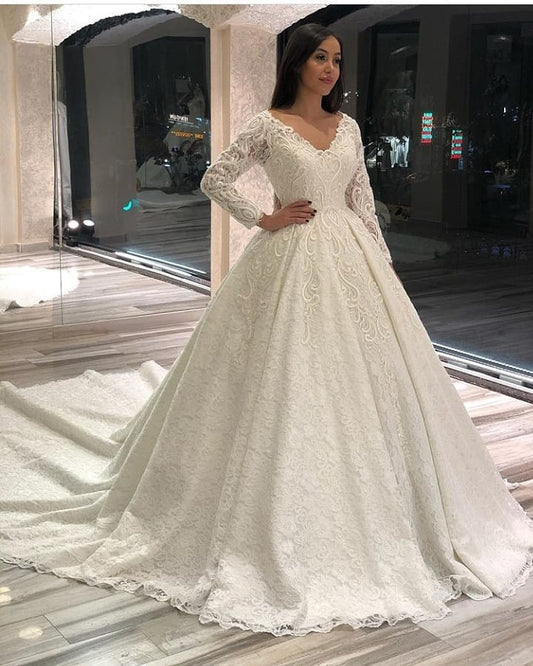 Elegant Floor-length Deep V-neck A-line Wedding Dress with Lace Appliques and Long Sleeves