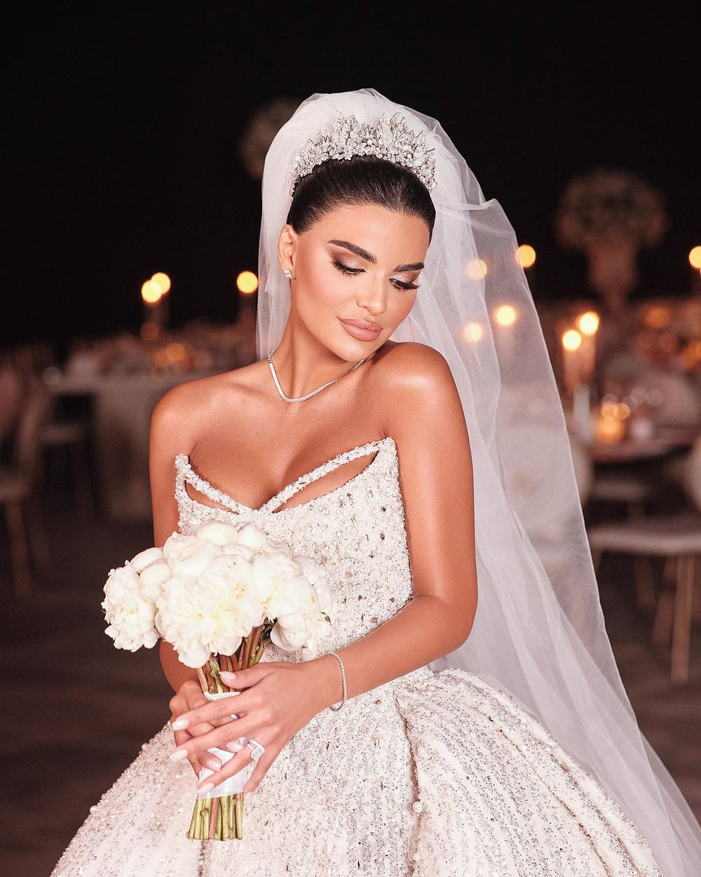 White Sleeveless Wedding Dress with Sequins and Beads on the Trail