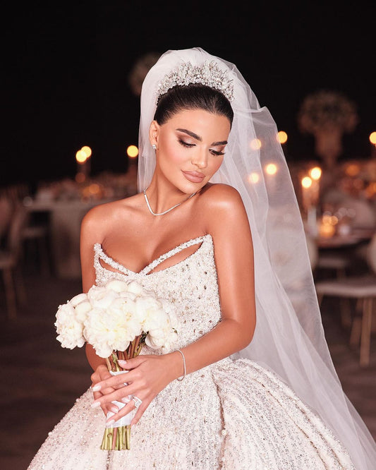 White Sleeveless Wedding Dress with Sequins and Beads on the Trail