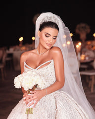 White Sleeveless Wedding Dress with Sequins and Beads on the Trail