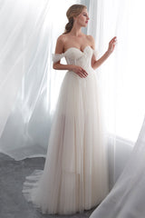Elegant Long Tulle Wedding Dress with Off-the-Shoulder Design