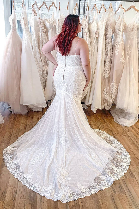 Elegant Backless Mermaid Wedding Gown with Spaghetti Straps and Lace Appliques