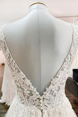 Elegant Backless Long A-line Wedding Dress with V-neck, Tulle Ruffles, and Lace