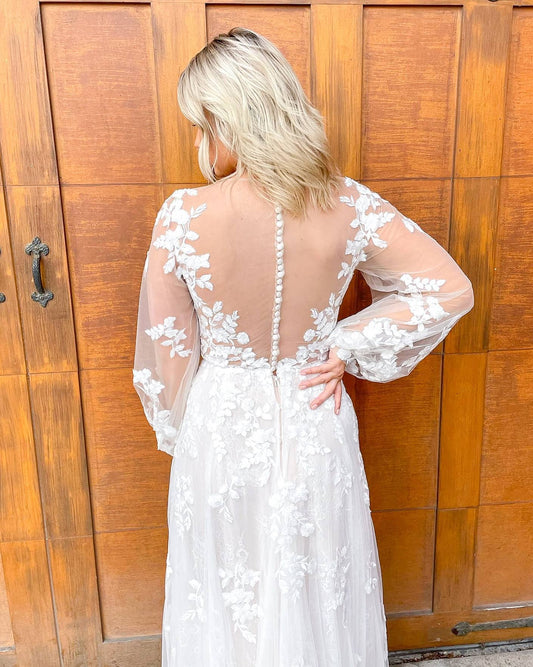 Elegant Deep V-neck Sheath Wedding Gown with Lace Appliques and Long Sleeves