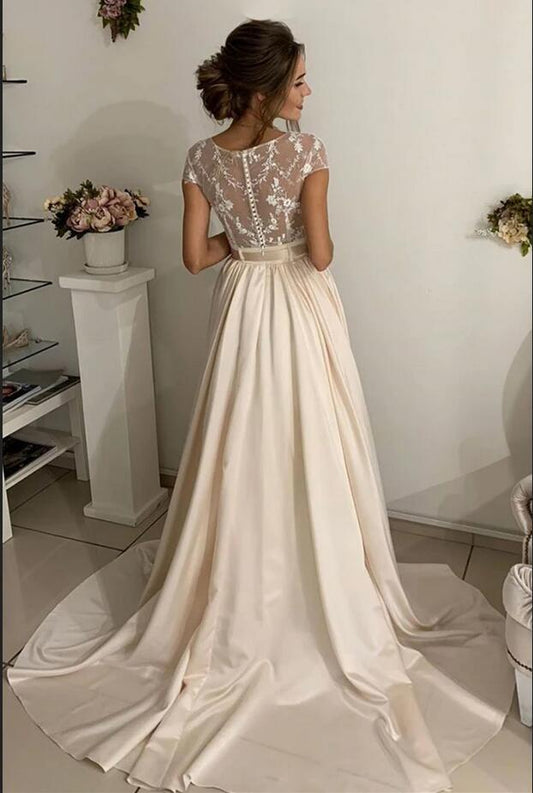 Elegant stretch satin A-line bridal gown with lace details