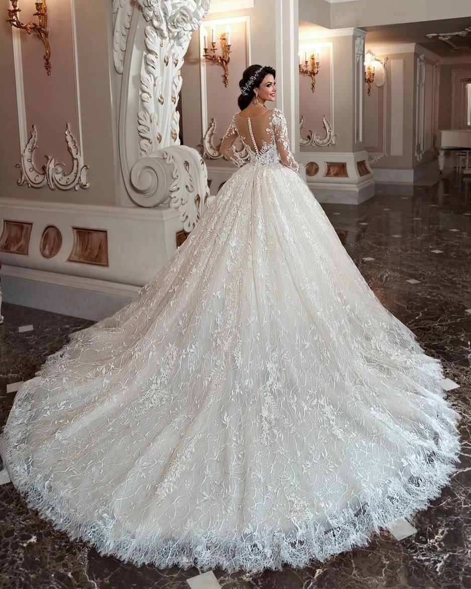 Elegant Long-Sleeve Wedding Dress with Beading and A-Line Lace Appliques