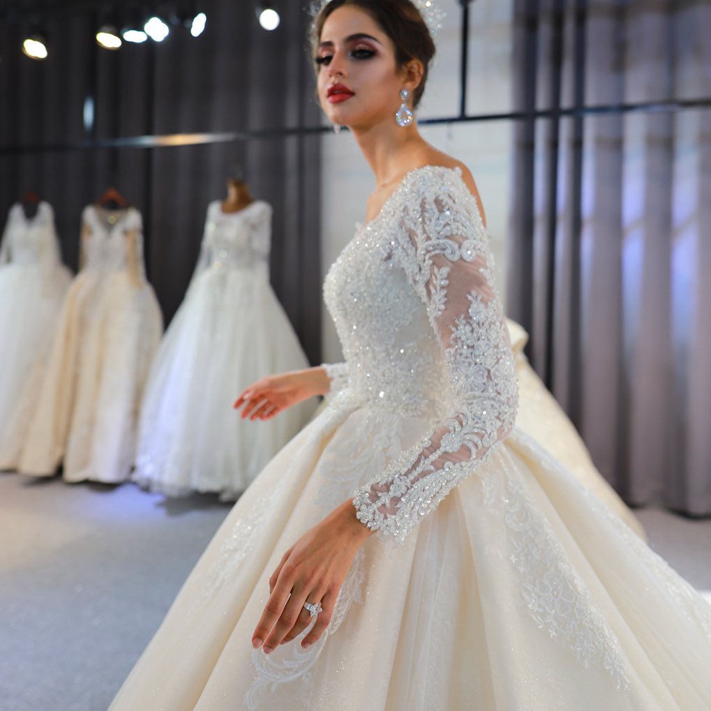 Sweetheart Backless Modest A-Line Wedding Gown with Long Sleeves and Lace Appliques Sequins