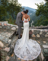 Elegant Mermaid Wedding Gown with Spaghetti Straps, V-neck, and Lace Details
